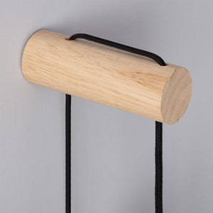 Wandlamp hout voor lamp slaapkamer naast het bed